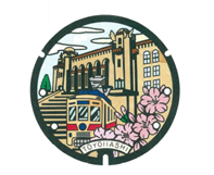 市電と公会堂のマンホール
